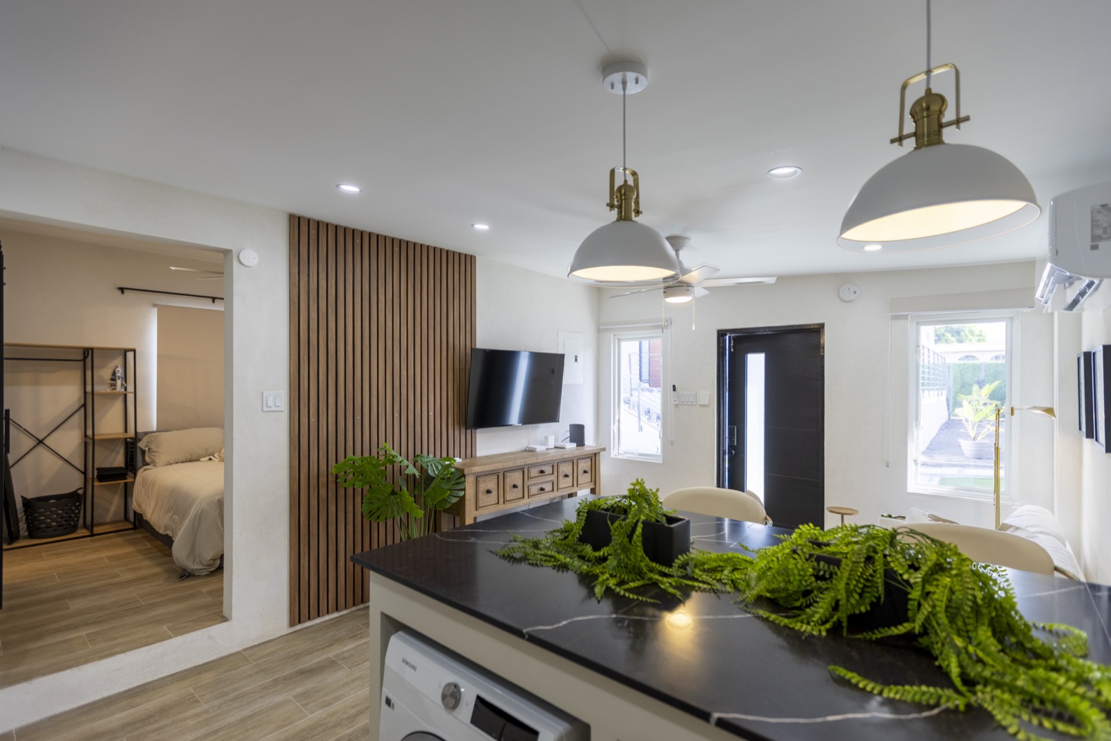 Cottage kitchen with a glimpse through to the bedroom