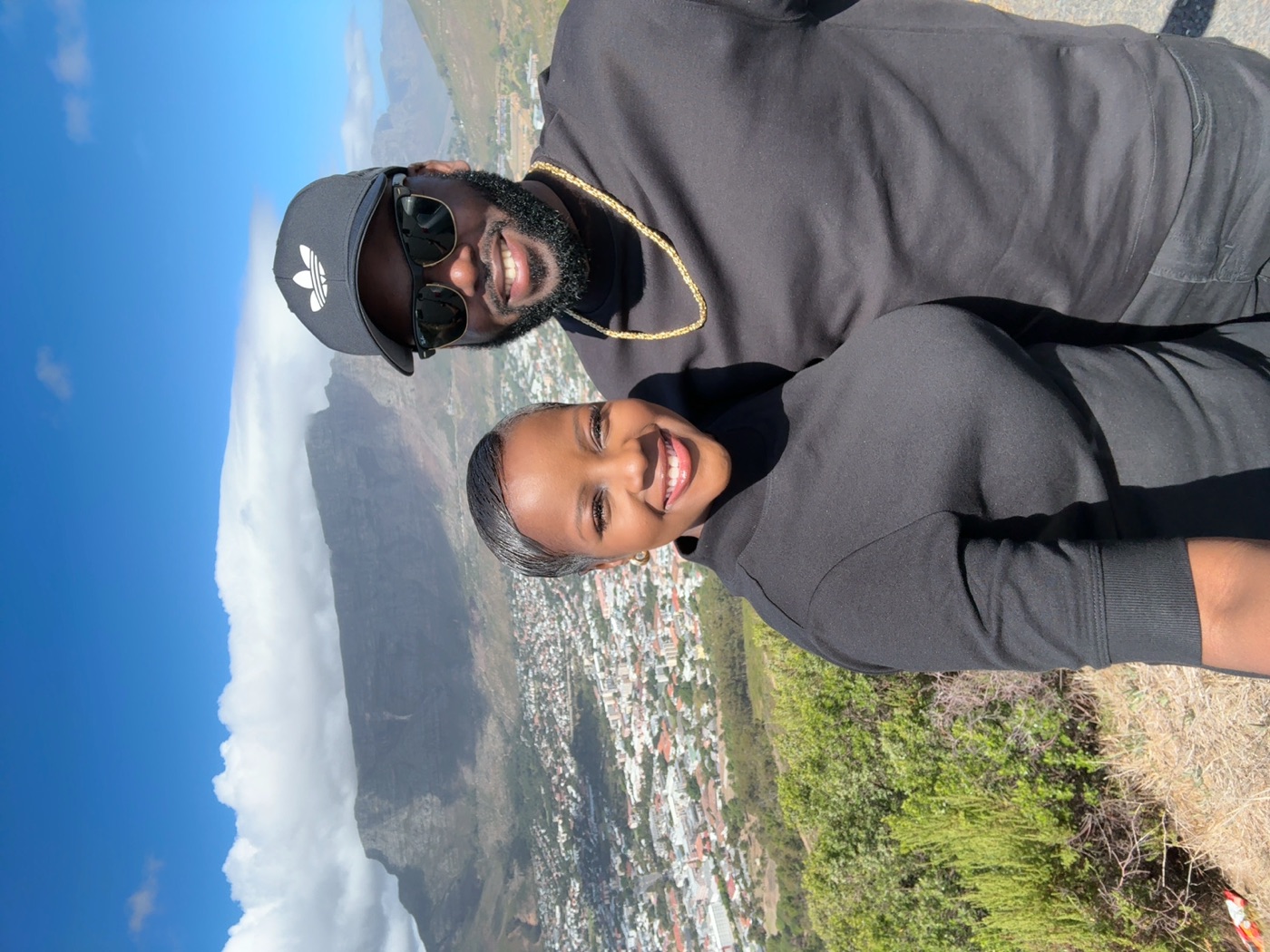 Renaldo and Khadija — Cape Town, with Table Mountain behind them
